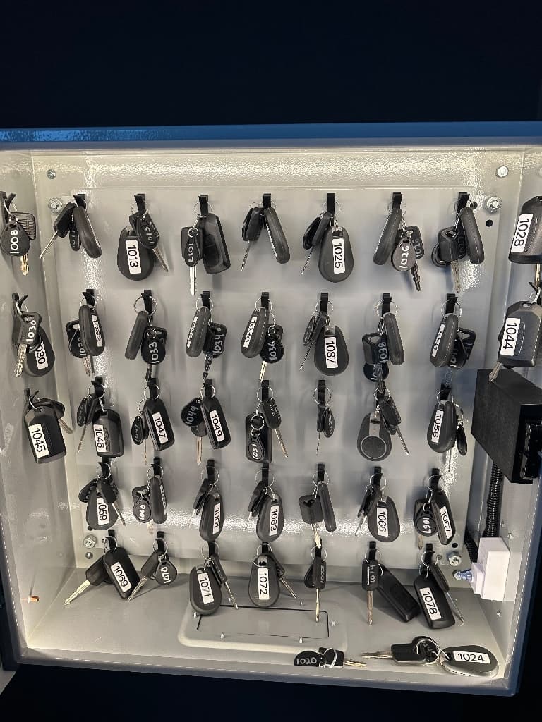 Organized physical key and credential management cabinet
